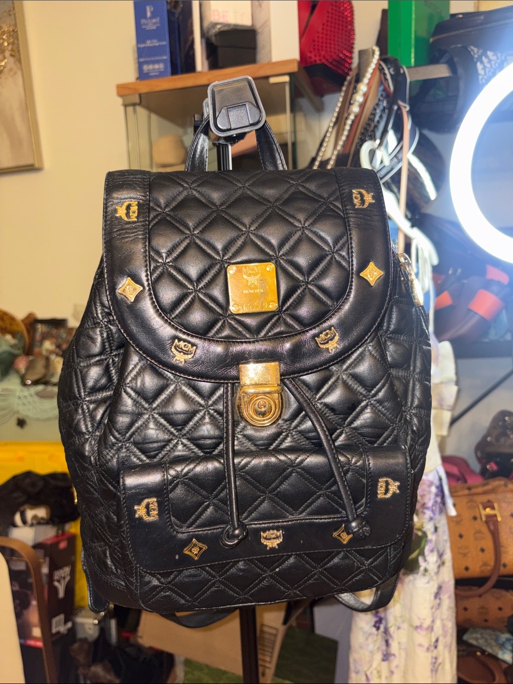 MCM Black Quilted Leather Backpack with Gold Accents